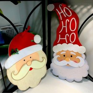 Two Decorative Santa Faces